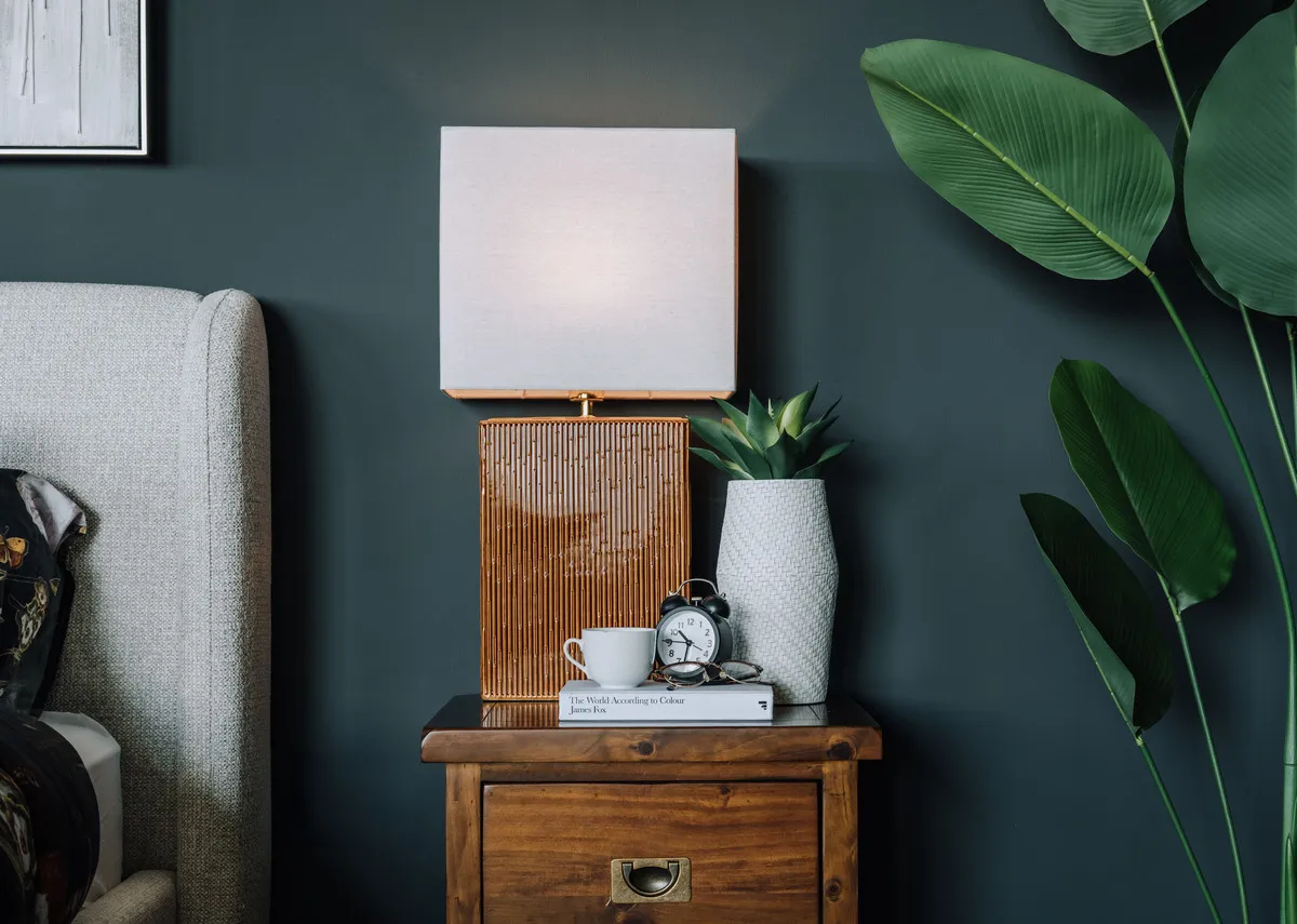 A lifestyle image of the Jade vase on a Leya locker in a bedroom