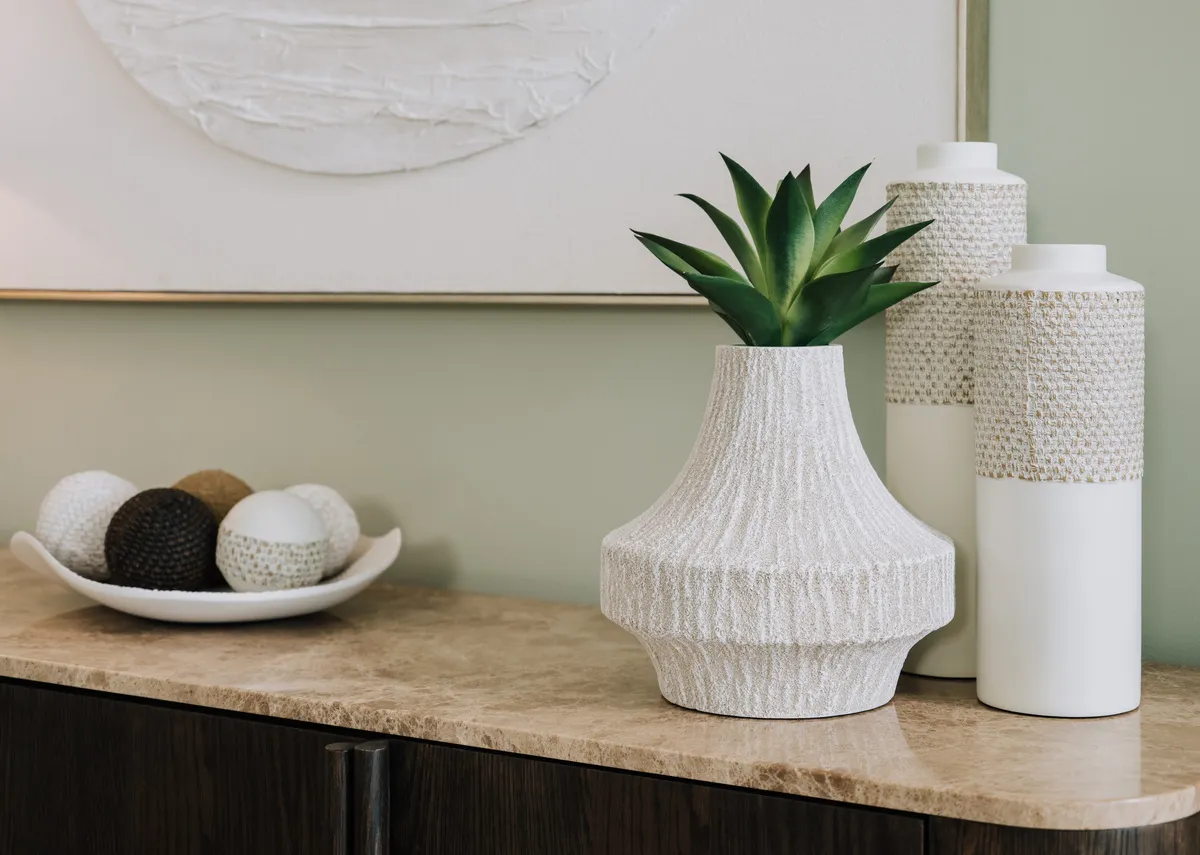 A lifetsyle image of the Cremon large  vase with the Hibiscus vases