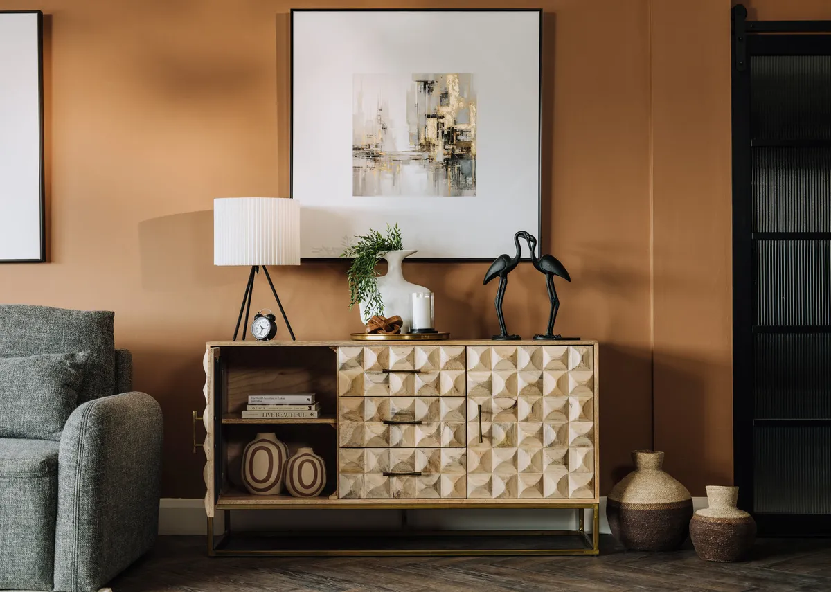 A 2 door 3 drawer mango sideboard from EZ Livings Diva range. Closeup of metal handle and mosaic style front.
