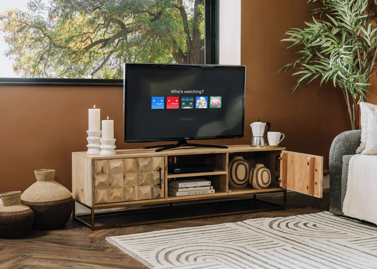 A mango wood tv unit from EZ Livings Diva range. Closeup of middle shelves.