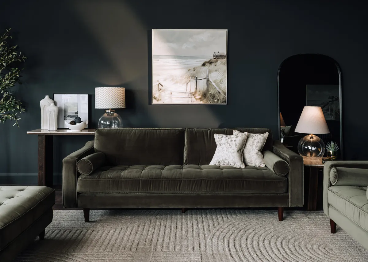 A lifestyle image of the Genoa green 3 seater with Coastland print and Margo and Ethel table lamps