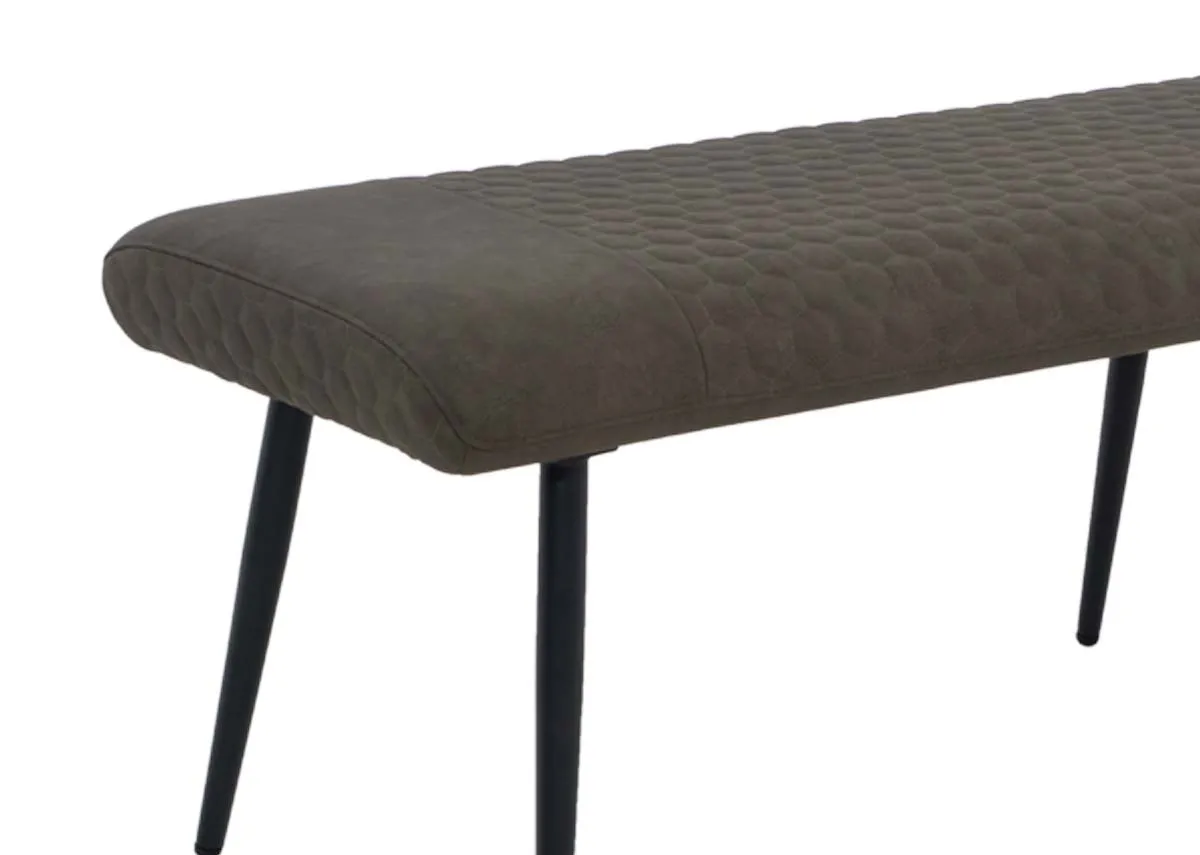 A flat dining bench with green faux leather fabric from EZ Livings Barton range.Closeup of honeycmb design on seat
