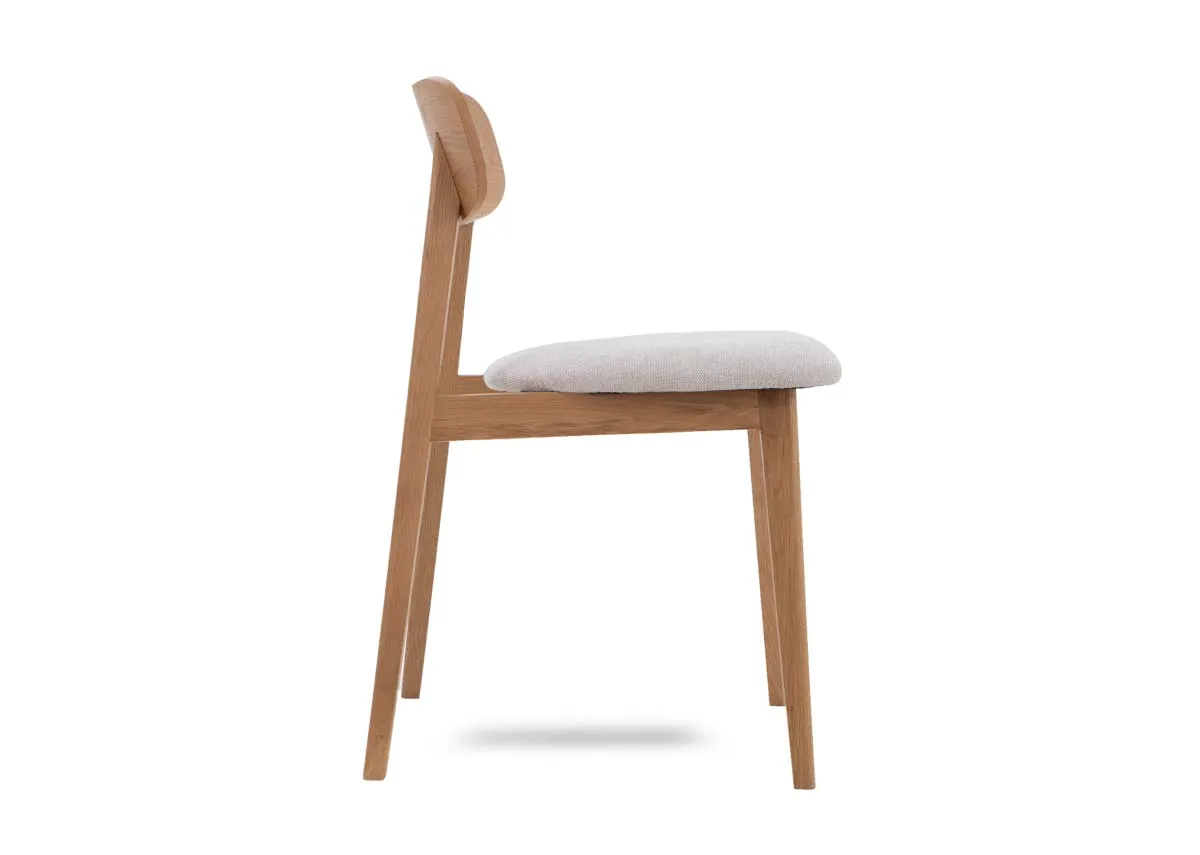 An oak dining chair with fabric seat from EZ Livings Hudson range. Side view