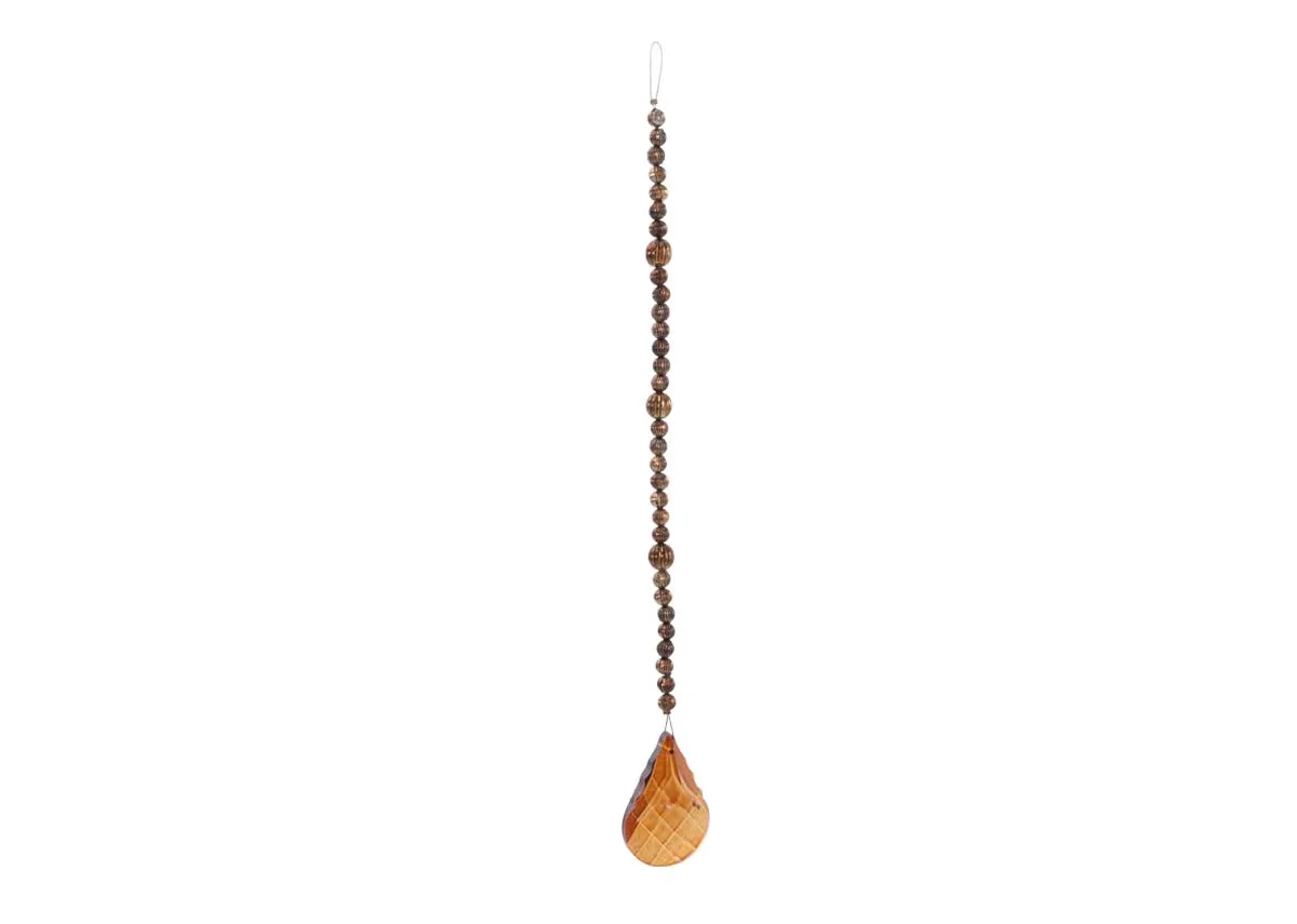 A brass large crystal garland with a string of textured brown beads leading to a large faceted amber colored crystal drop.
