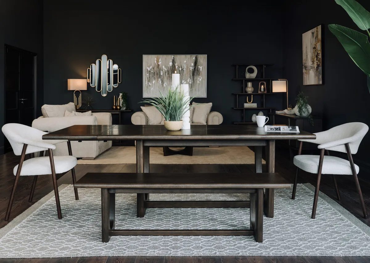 A lifetsyle image of the Flow dining table with bench and elk chairs