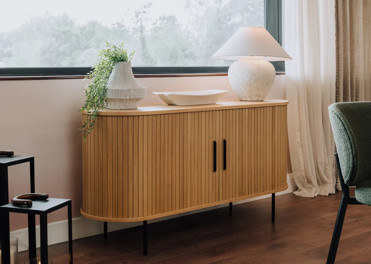 A lifestyle image of the Nola natural oak sideboard.