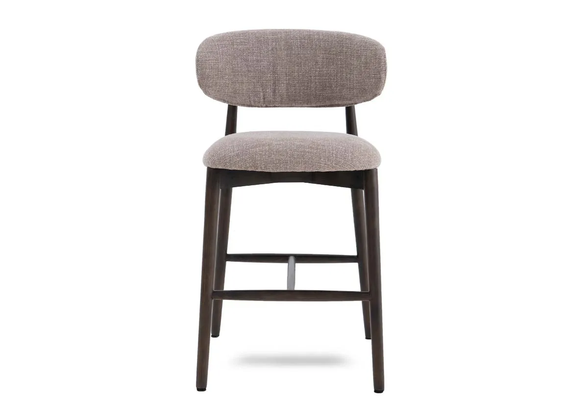 A beige fabric counter bar stool with drown wood frame from EZ Livings Hazel range. Front view