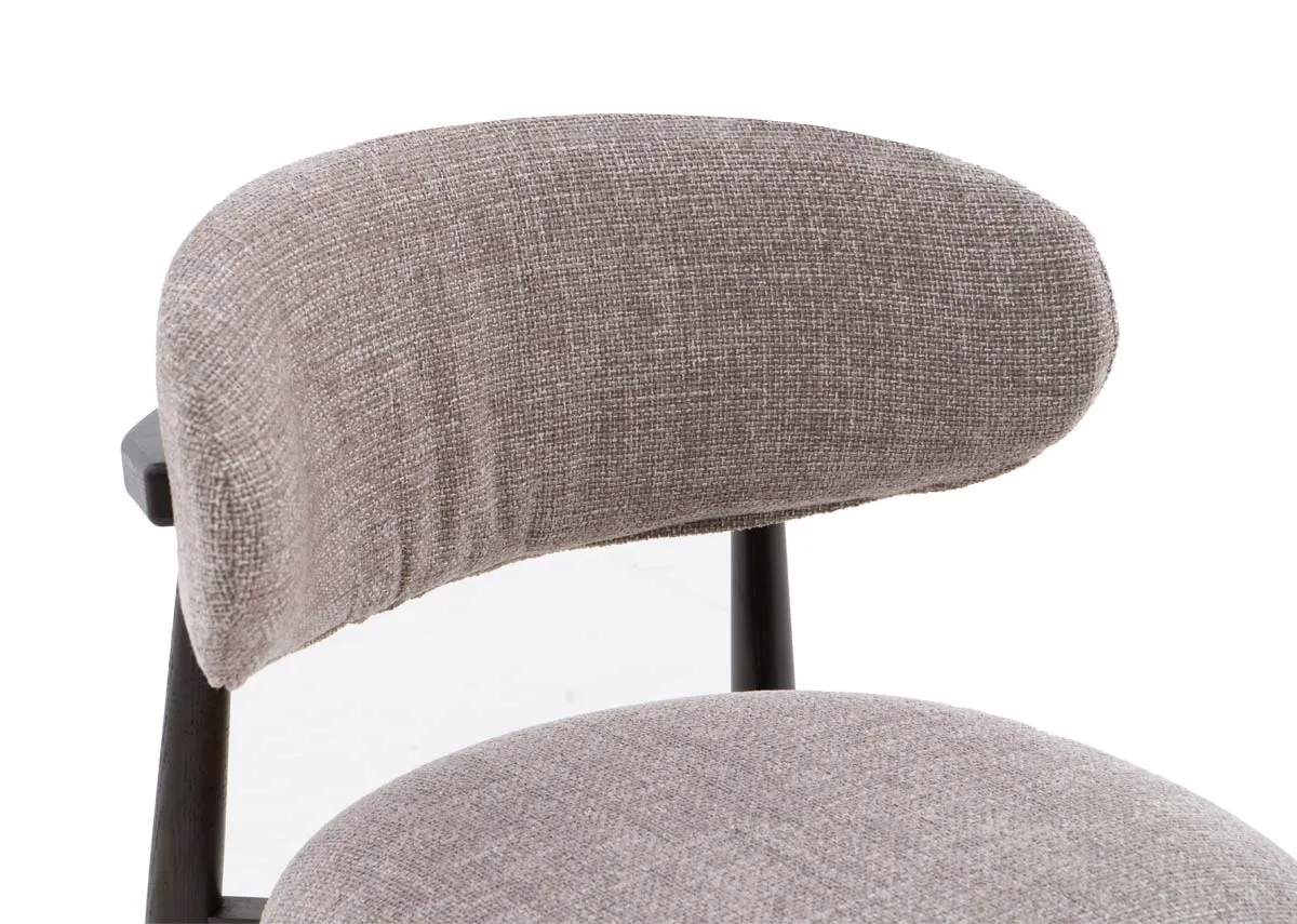 A beige fabric counter bar stool with drown wood frame from EZ Livings Hazel range. Closeup of fabric seat back