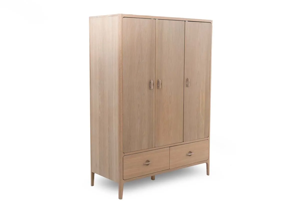 An angled view of the Jay 3 door 2 drawer wardrobe in white oak.