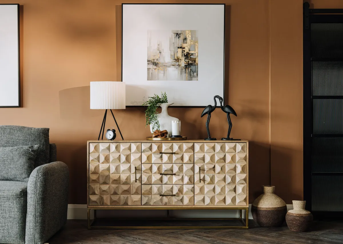 A lifestyle image of the Elevate 2 print over the Diva sideboard with starlette lamp