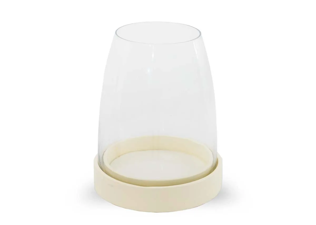 A cream base with glass holder for candle from EZ Livings Carnation range.