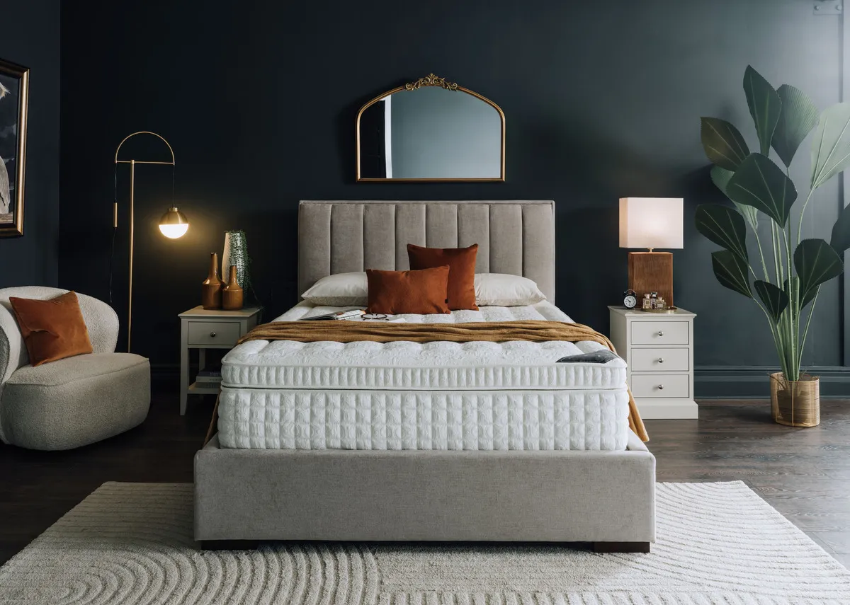 A lifestyle image of the Legacy mattress on the Liberty bed with Erika mirror.