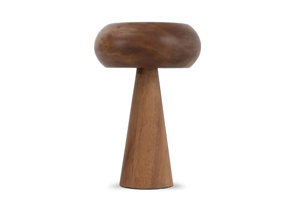 A mushroom shaped table lamp crafted from wood. Front view