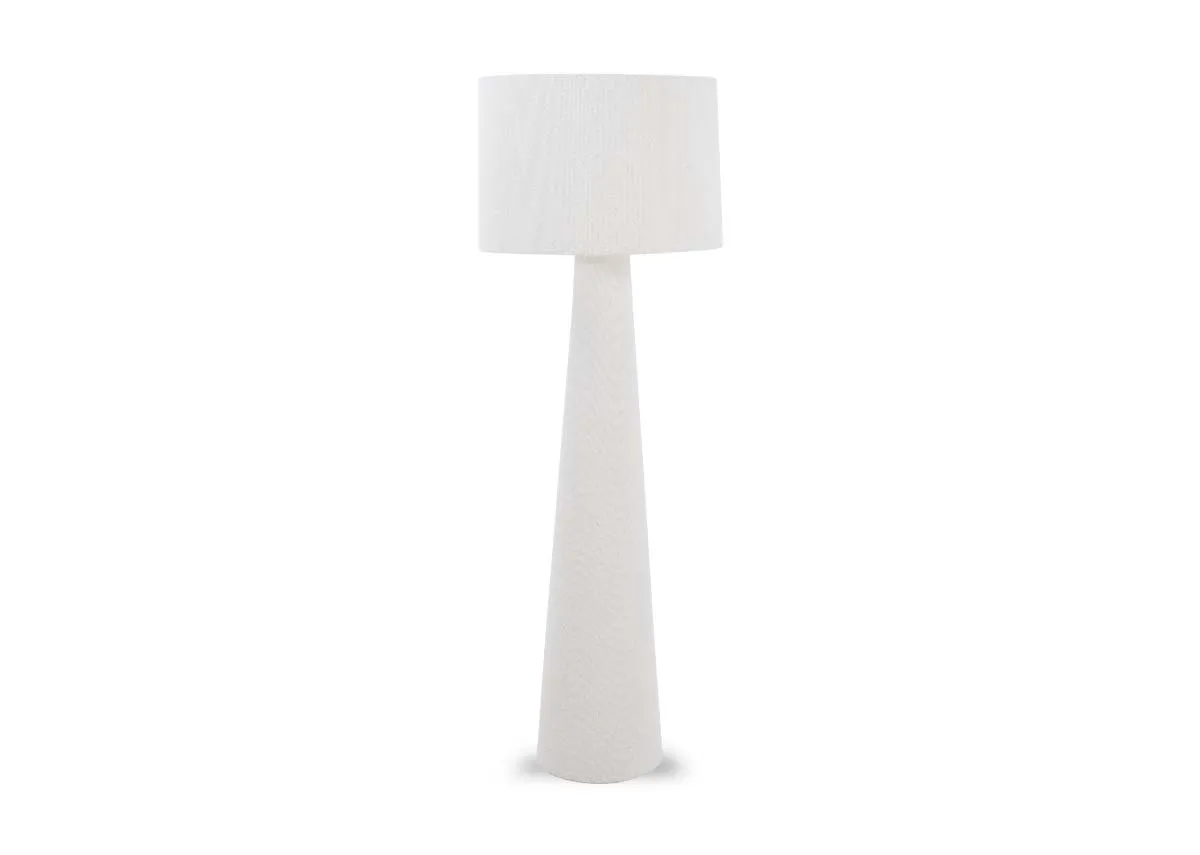 A white floor lamp with boucle shade from EZ Livings Tullow range. Front view.