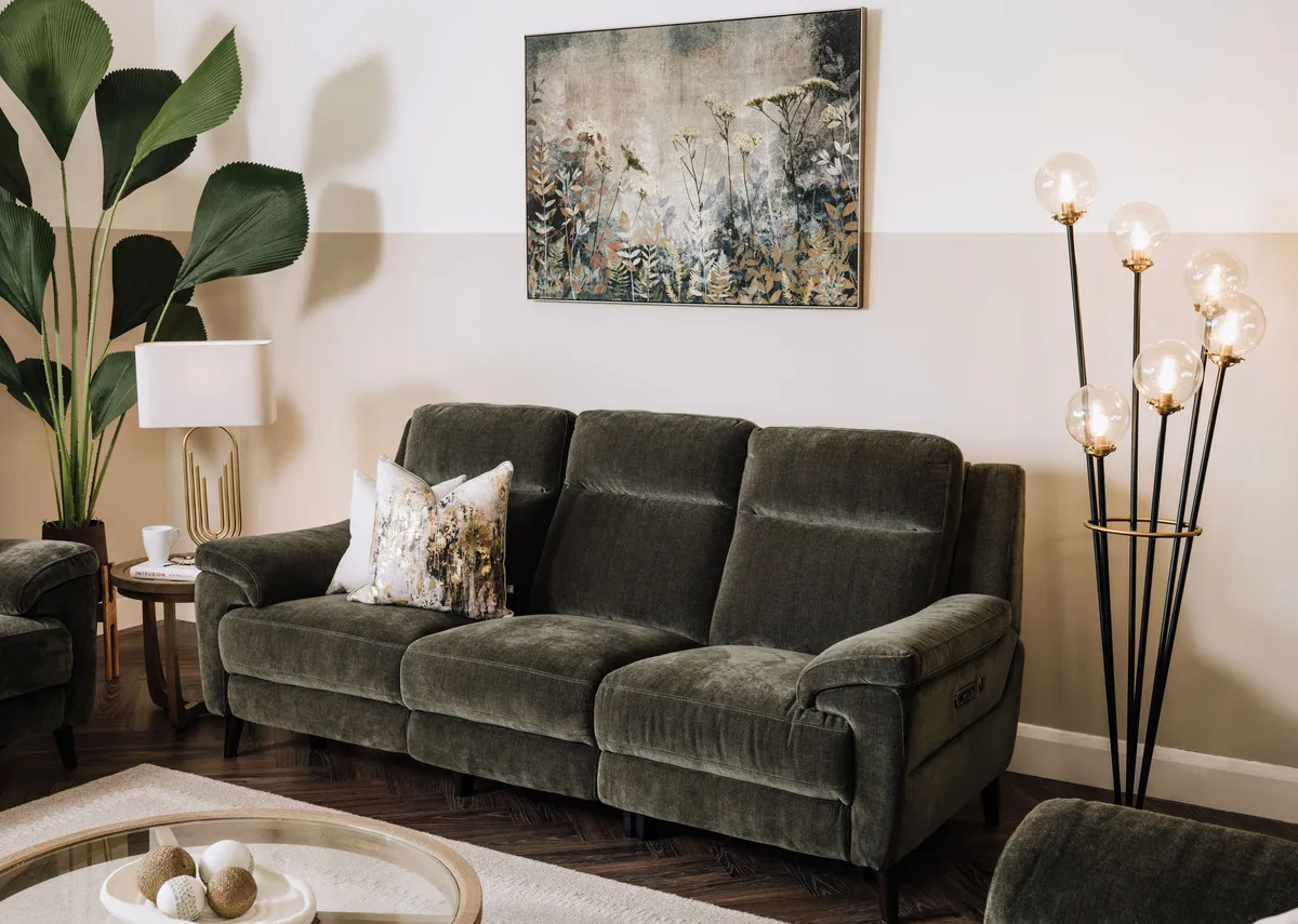 A lifestyle image of the Elliot green 3 seater sofa with Alexis tables and Fanciful print.