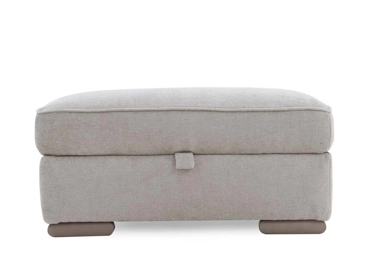 A beige rectangular footstool from EZ Livings Olivia rangeFront veiw of lift tab
