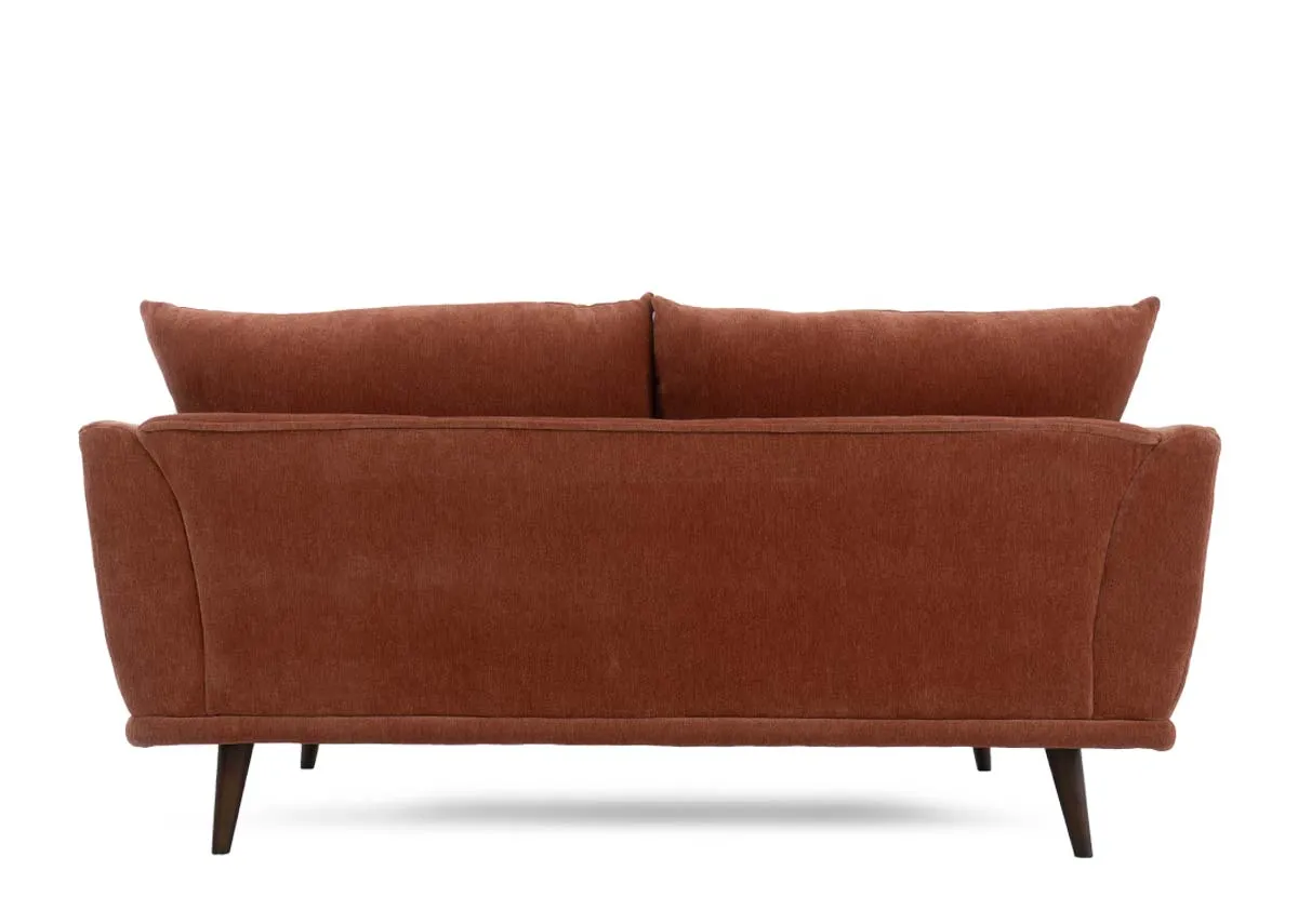 Two seater sofa in rust fabric presented from a back view with two seat and two back cushions.