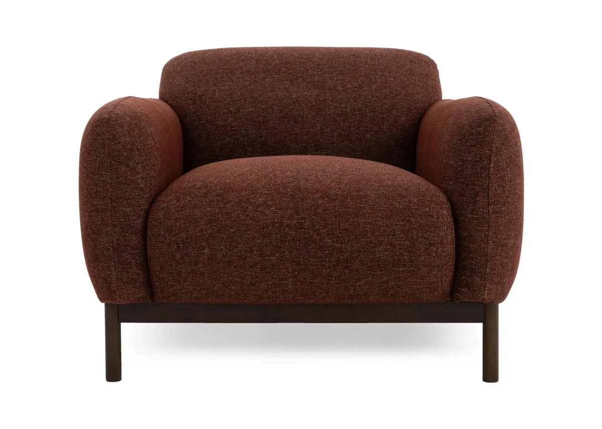 A brick rust fabric armchair from EZ Livings Loft range. Front view