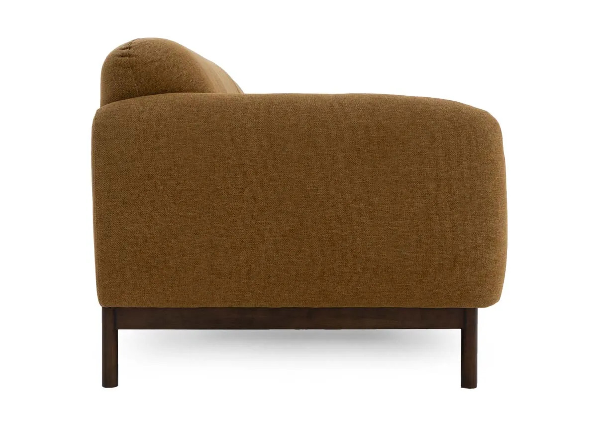 A mustard gold 3 seater sofa from EZ Living Furnitures Loft range.Side view of low armrests