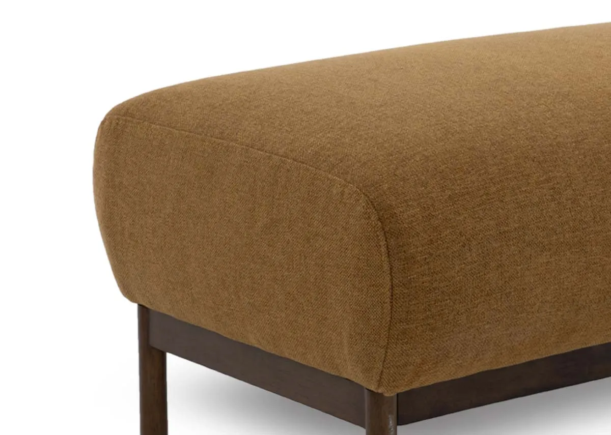 A gold mustard fabric footstool from EZ Livings Loft range. Closeup of fabric