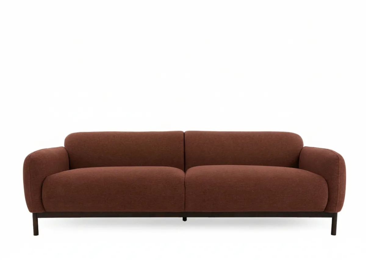 A brick rust fabric 3  seater sofa from EZ Living Furnitures Loft range.  Front view