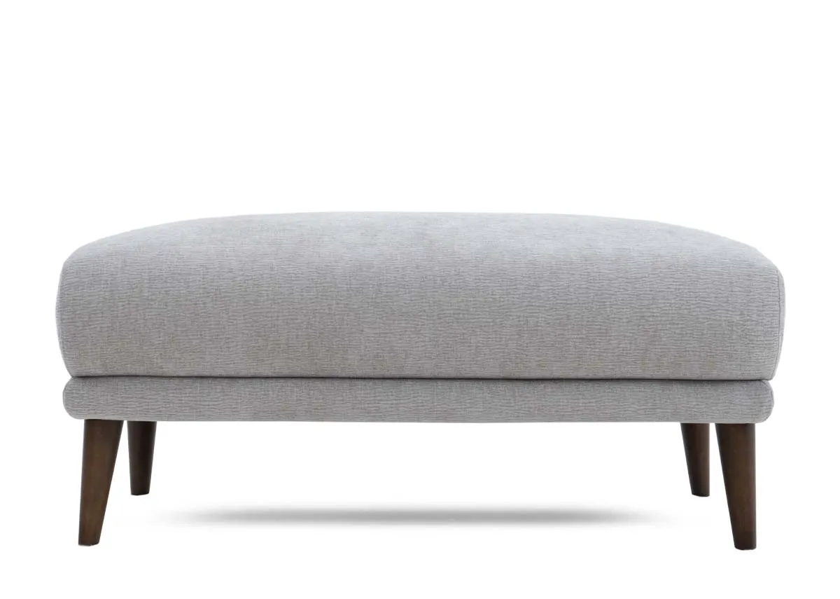 A silver fabric footstool with 103cm x 63cm x 45cm