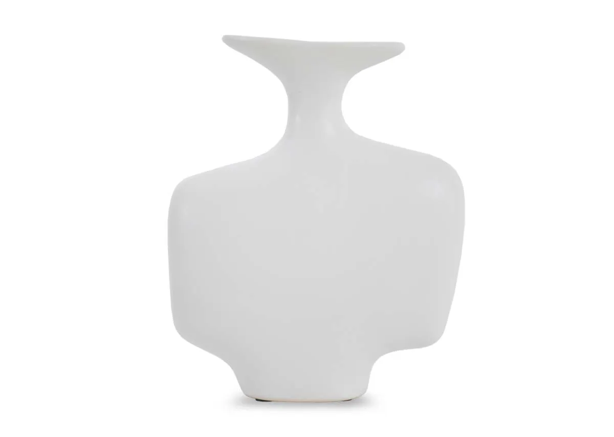 A large white ceramic decorative item with an abstract sculptural shape and a flared top opening.