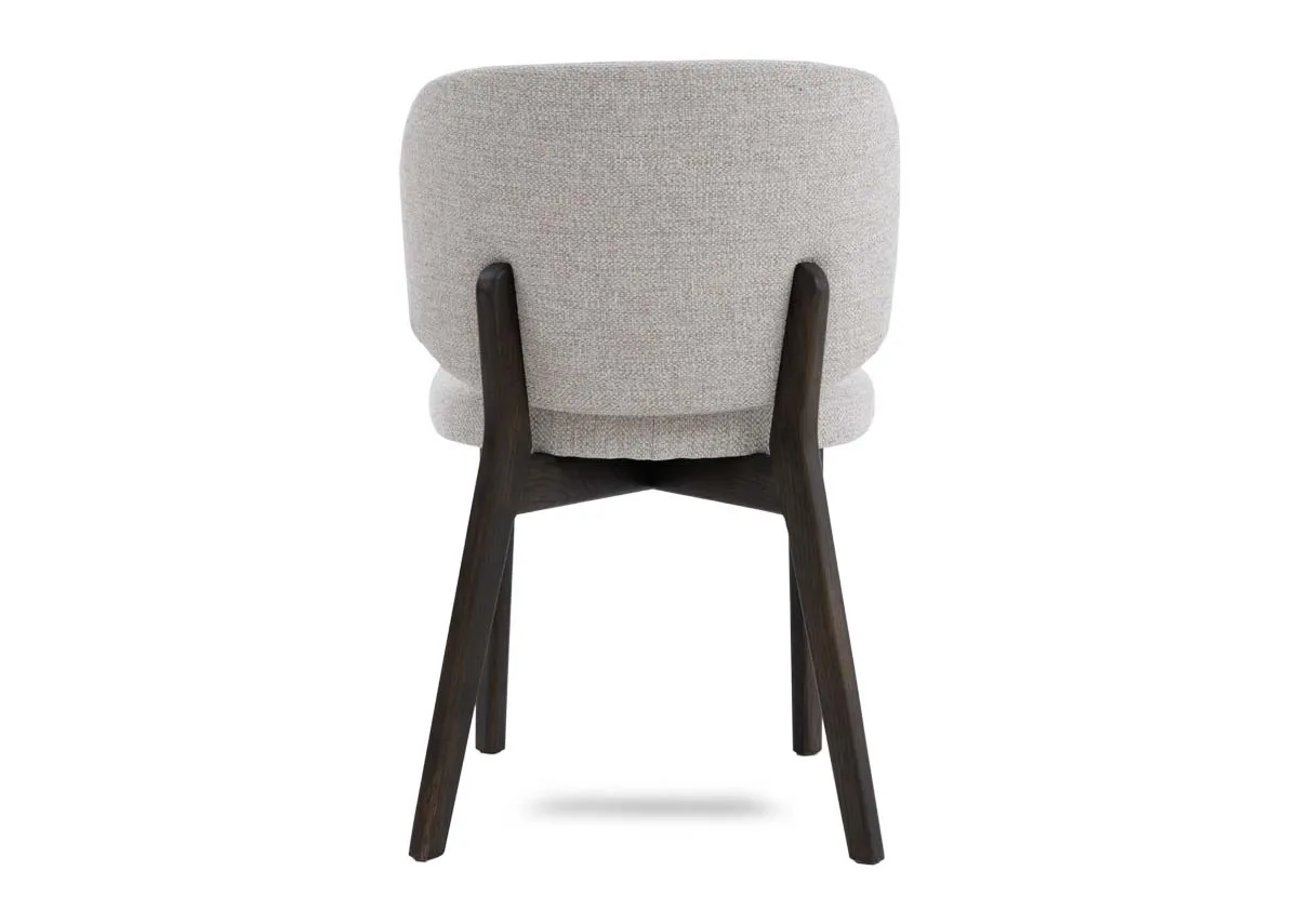 A beige fabric dining chair with espresson brown legs from EZ Livings Swan range.Back view of supportive frame