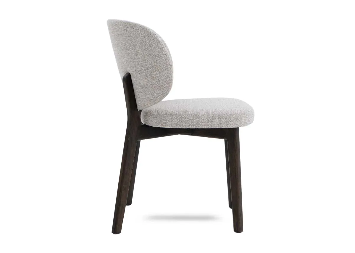 A beige fabric dining chair with espresson brown legs from EZ Livings Swan range.Side view