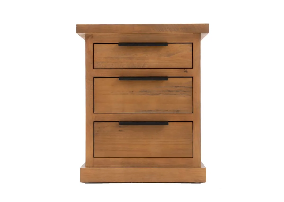 A front view of a light brown wooden bedside locker with three black horizontal handled drawers.