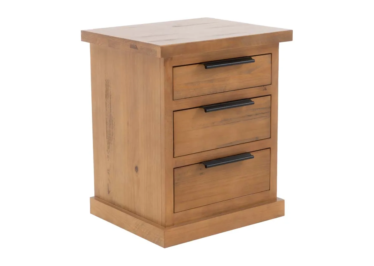 An angled front view of a light brown wooden bedside locker with three black horizontal handled drawers.