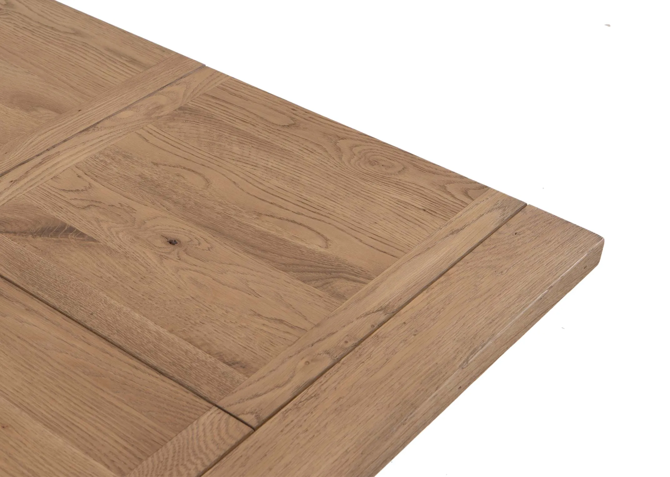 An oak dining table from EZ Livings Toulon range. Closeup of wood textrue and grain.