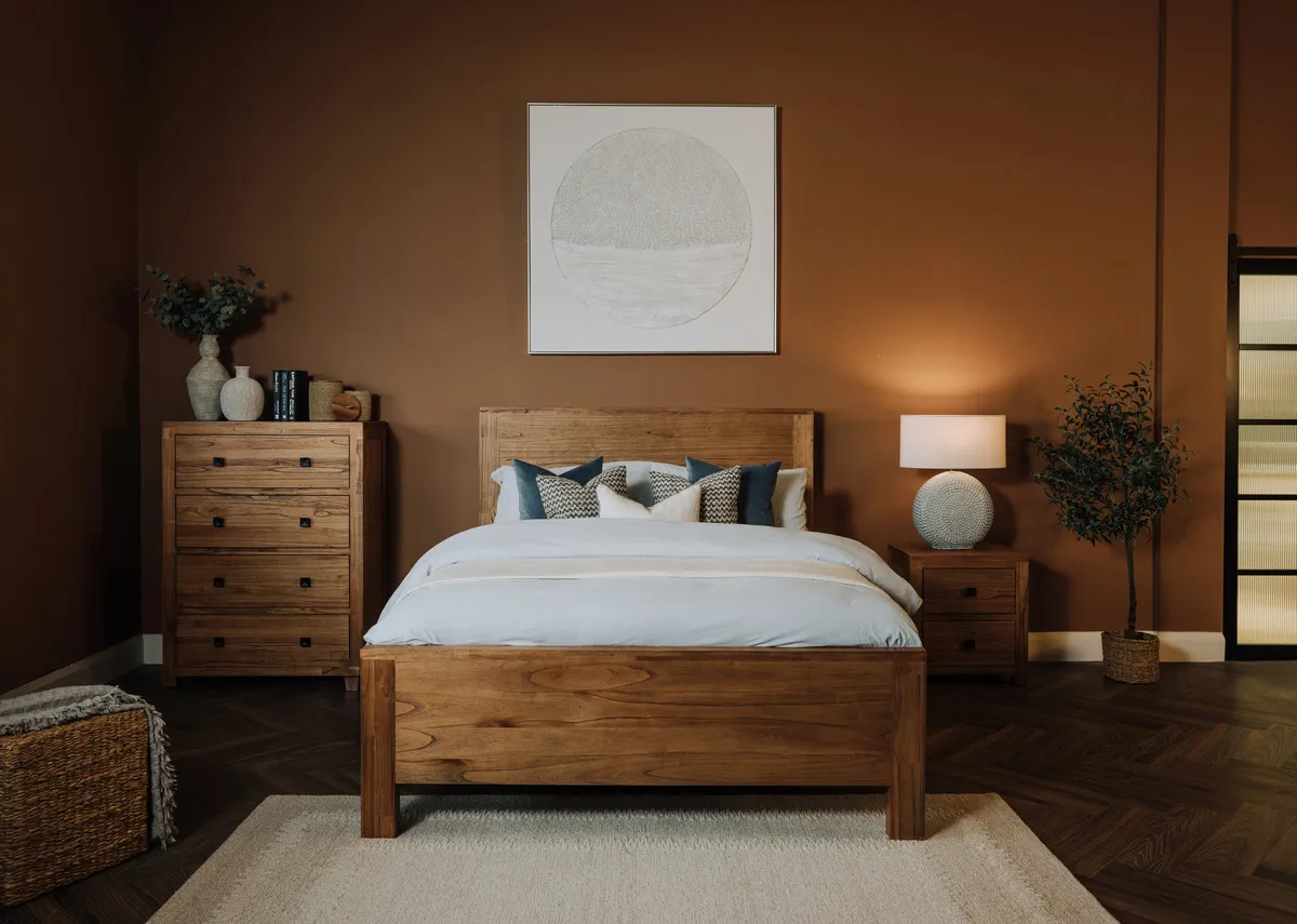A lifestyle image of the Outback bedframe with locker with dresser and Pathways canvas.