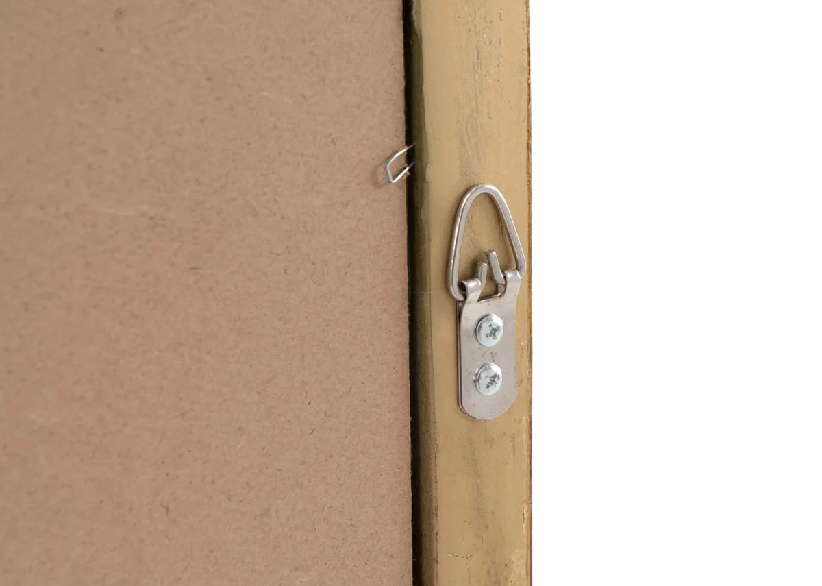 A long slim oval framed mirror with ornate detail in gold from EZ Livings Julieta range.Closeup of wall hanging mechanism on the back 