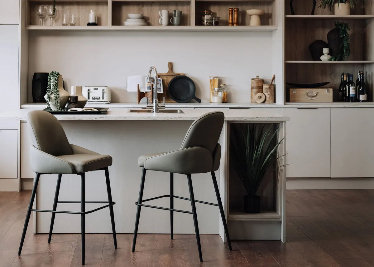 A lifestyle image of the Tempo Counter stools at a kitchen island.
