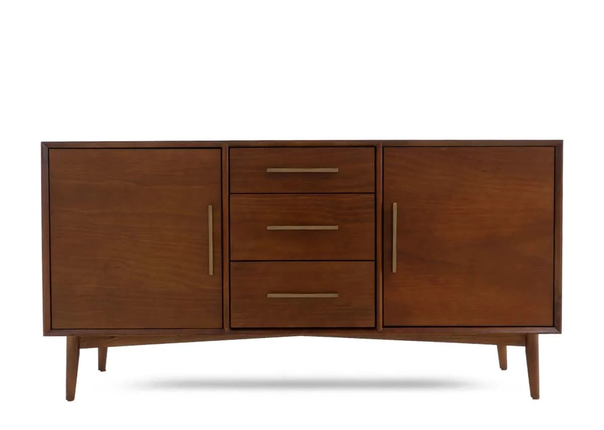 A dark pine sideboard with two solid doors on either side and three central drawers all featuring brass bar pulls.
