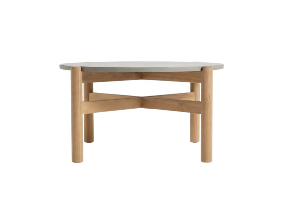 A round garden coffee table with concrete top from EZ Livings La Palma range. Side view