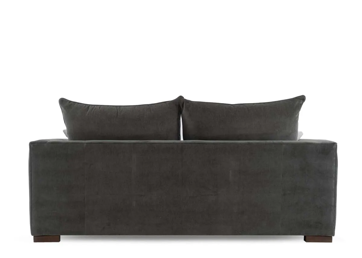 A 3 seater sofa in spruce green fabric from EZ Livings Lucius range.Back view