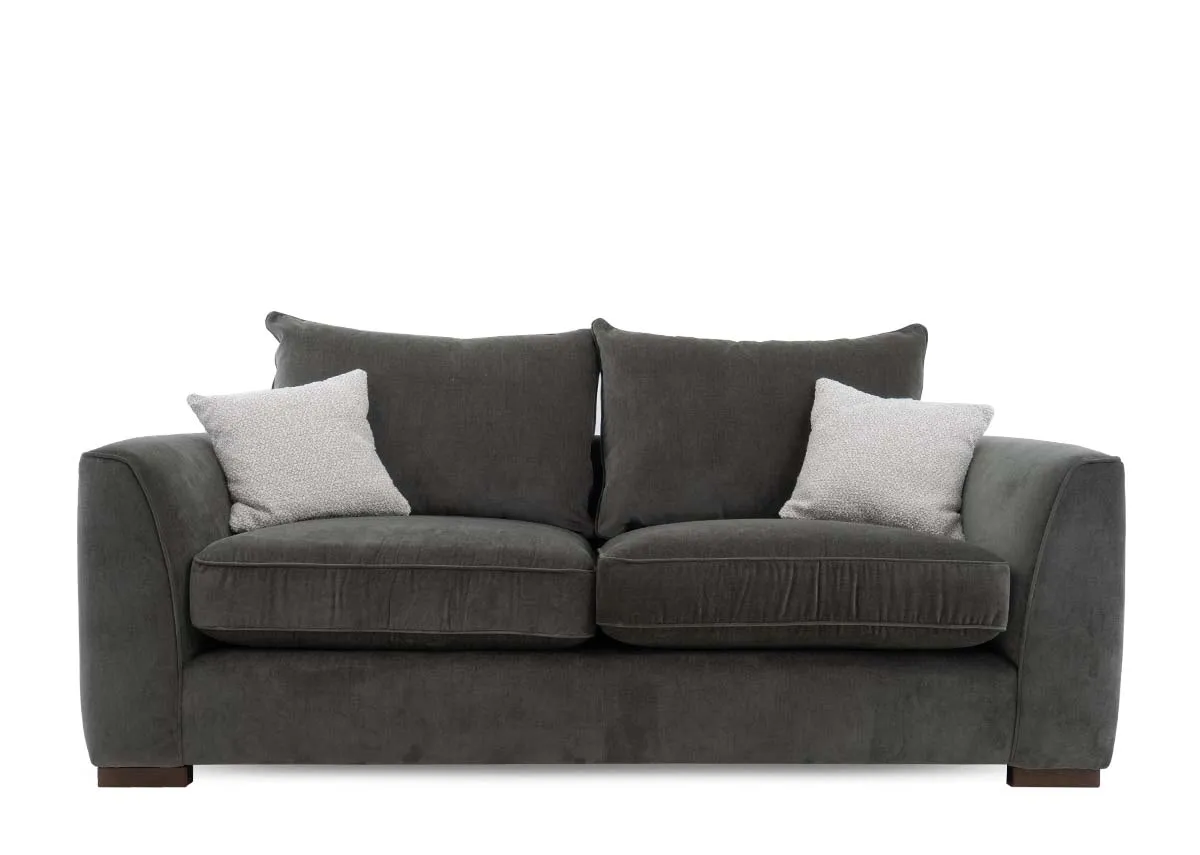 A 3 seater sofa in spruce green fabric from EZ Livings Lucius range. Front view of high back and 2 scatters.