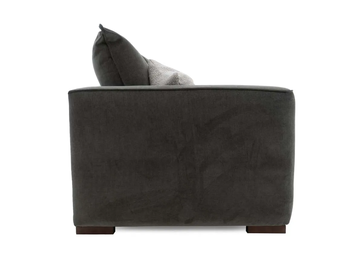 A 3 seater sofa in spruce green fabric from EZ Livings Lucius range.Side view