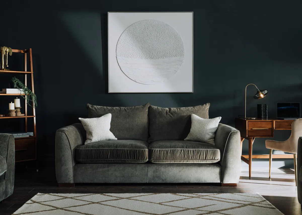 A lifestyle image of the Lucius 3 seater sofa with Leya side and Pathways print.