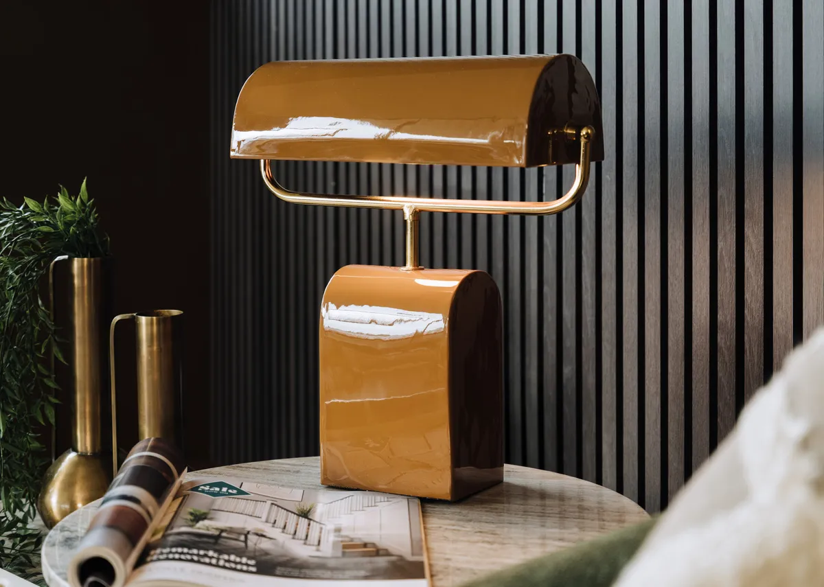 A lifestyle image of the Cardona table lamp with Blanco side table