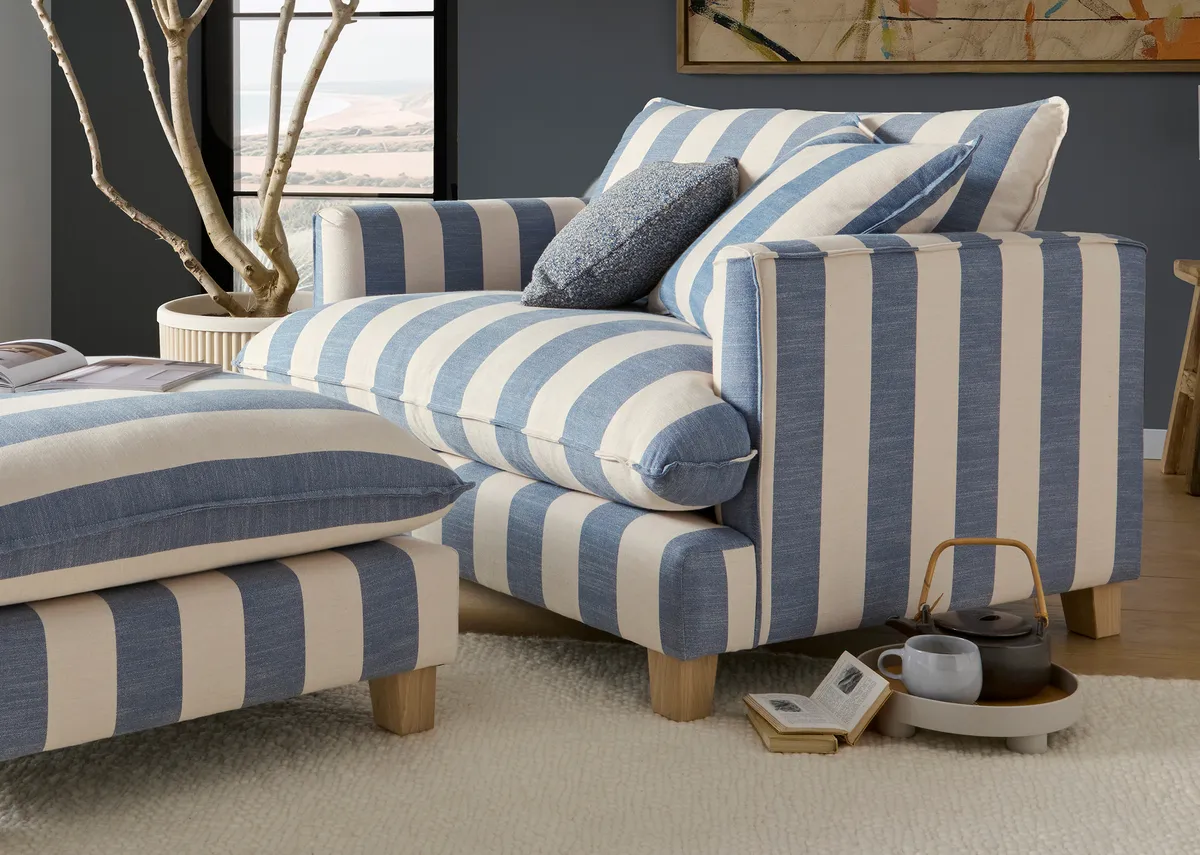 A lifestyle image of the Howth cuddler with matching footstool