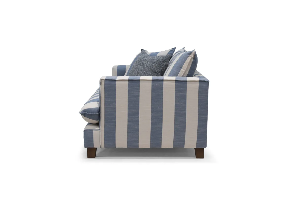 A blue & white stripe cuddler from EZ Living Furnitures Howth range. Side view