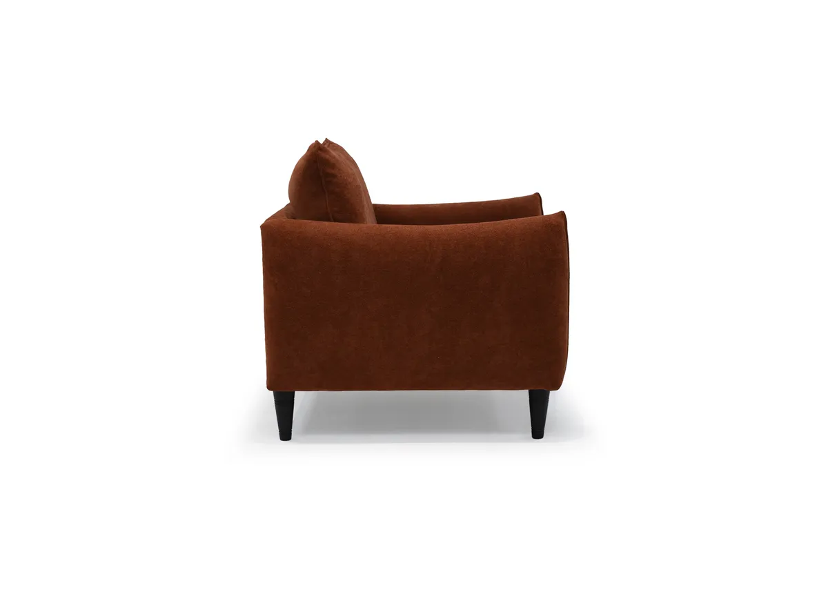 A rust boucle armchair from EZ Living Furnitures Kenmare range.Side view