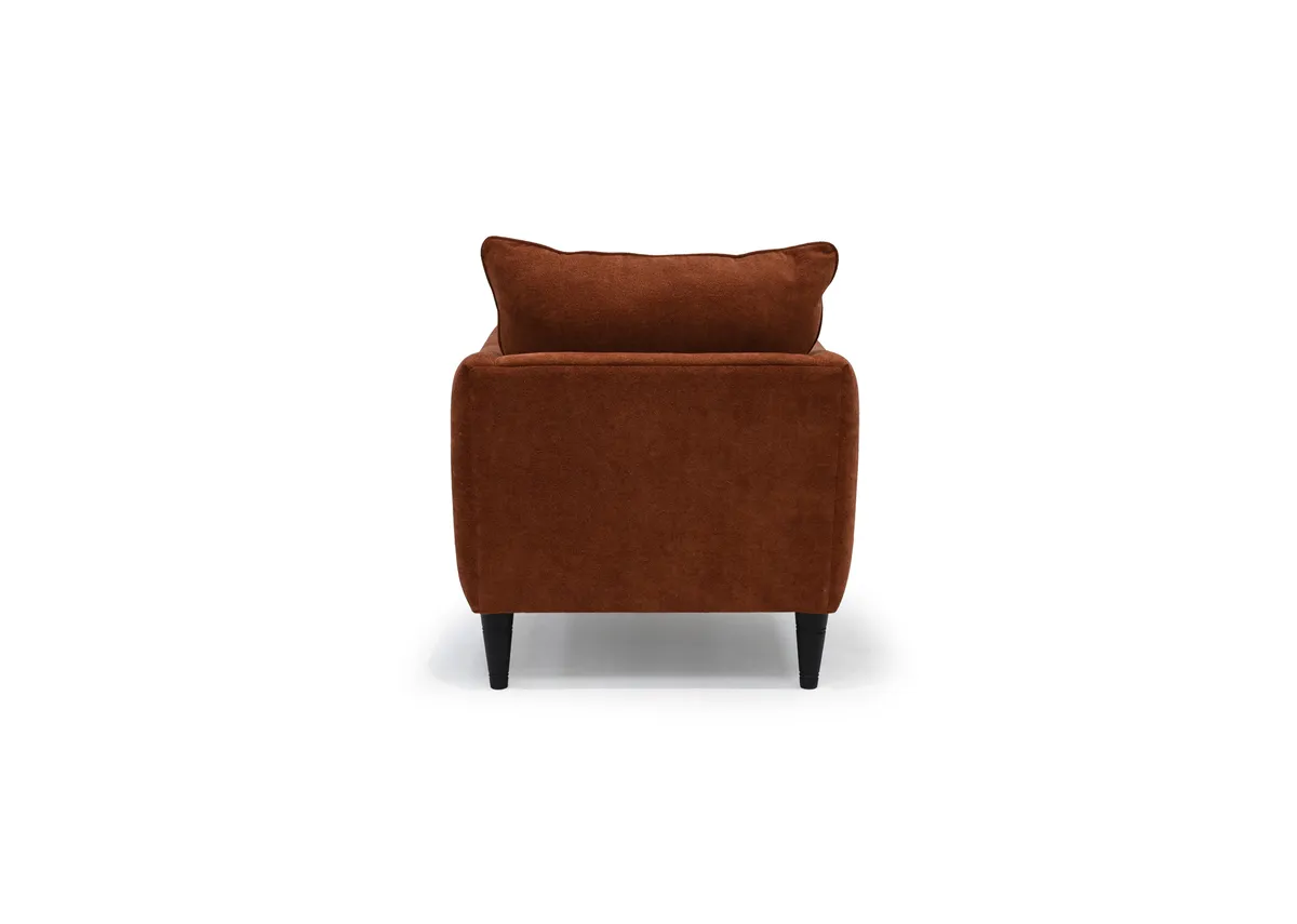 A rust boucle armchair from EZ Living Furnitures Kenmare range.Back view.