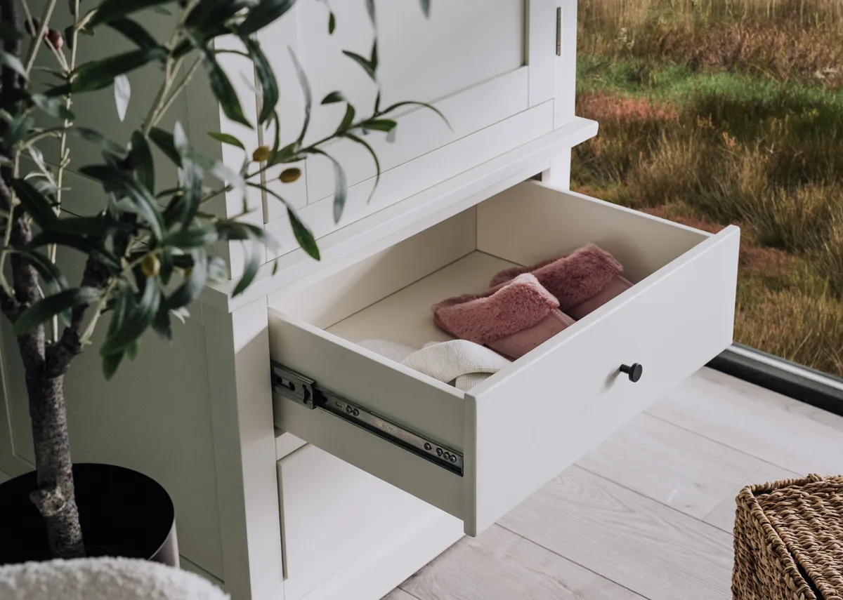 A 1 door 2 drawer white wardrobe from EZ Livings Atlas range. Closeup of drawer open 