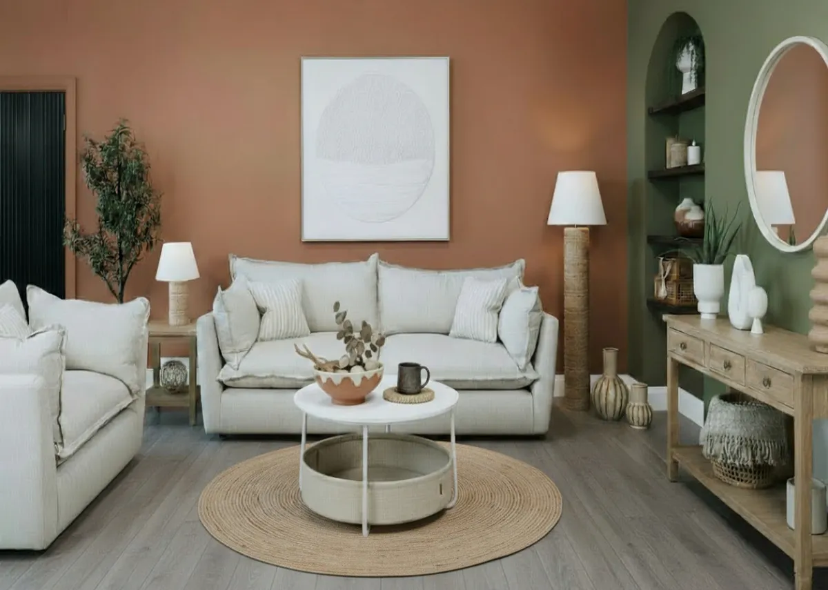 A lifestyle image of the Tara sofa with tucaway coffee table and Pathway canvas.