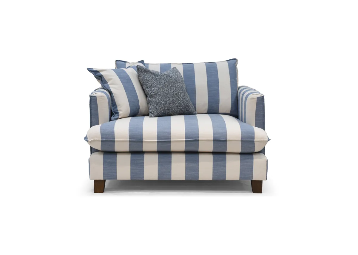 A blue & white stripe cuddler from EZ Living Furnitures Howth range.Front view of 2 scatters