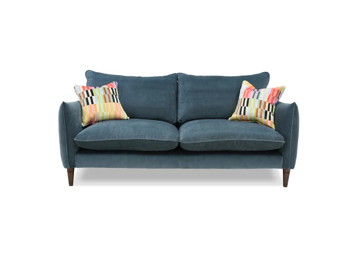 A 3 seater blue fabric sofa from EZ Livings Kenmare range. Front view of 2 multi stripe cushions.